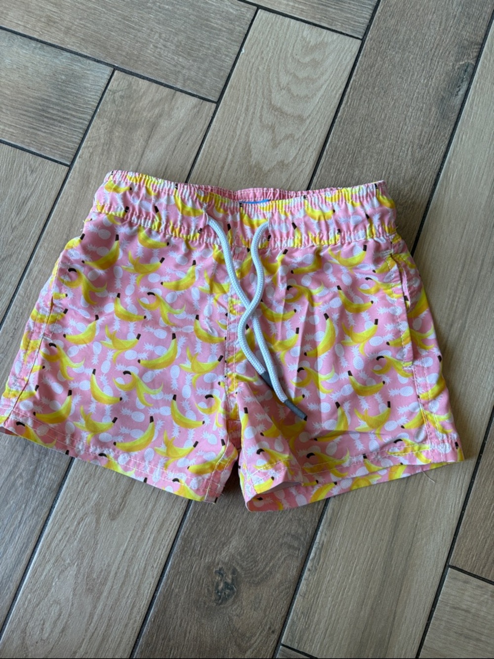 Boys Pink Banana Print Swim Trunks